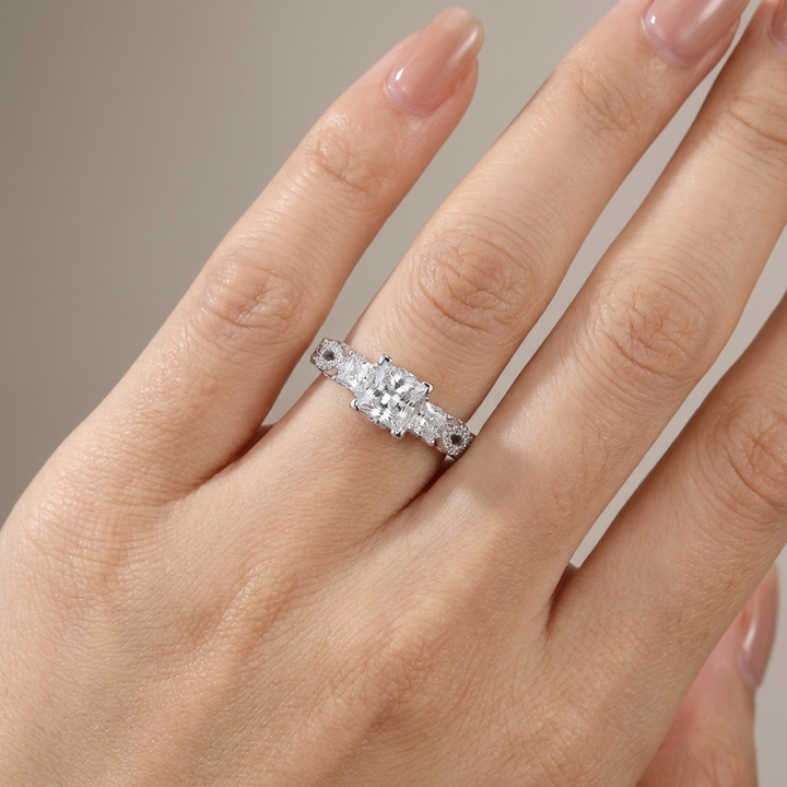THREE STONE ZIRCONIA SILVER TWIST RING